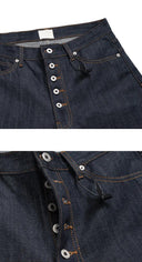 Jean évasé à pampilles effet usé