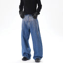 Jean évasé à pampilles effet usé