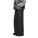 Pantalones holgados con pliegues