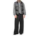 Pantalones holgados con pliegues