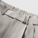 Pantalones holgados con pliegues