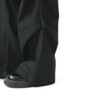 Pantalon ample à plis bruts