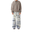 Jean évasé à pampilles effet usé