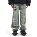 Jean évasé à pampilles effet usé