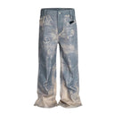 Jean évasé à pampilles effet usé