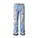 Jean évasé à pampilles effet usé