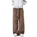 Pantalones holgados con pliegues