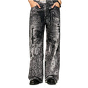 Jean évasé à pampilles effet usé