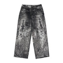 Jean évasé à pampilles effet usé