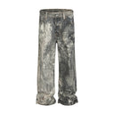 Jean évasé à pampilles effet usé