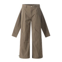 Pantalones holgados con pliegues