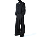 Pantalones holgados con pliegues