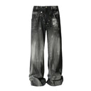 Jean évasé à pampilles effet usé