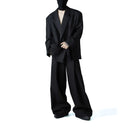 Pantalones holgados con pliegues