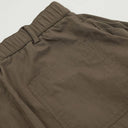 Pantalones holgados con pliegues