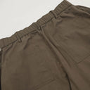 Pantalones holgados con pliegues