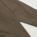 Pantalones holgados con pliegues