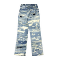 Jean évasé à pampilles effet usé