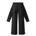 Pantalones holgados con pliegues