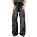 Jean évasé à pampilles effet usé