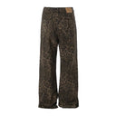 Vaqueros desgastados con borlas y campana