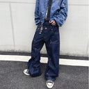 Jean évasé à pampilles effet usé