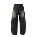 Jean évasé à pampilles effet usé