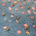 Jean évasé à pampilles effet usé