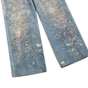 Jean évasé à pampilles effet usé