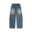 Jean évasé à pampilles effet usé