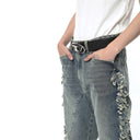 Distressed Flared Tassel Jeans